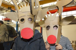 Two children with reindeer masks