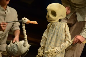 A skeleton and a goose puppet