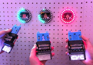 three microbit computers and LEDs